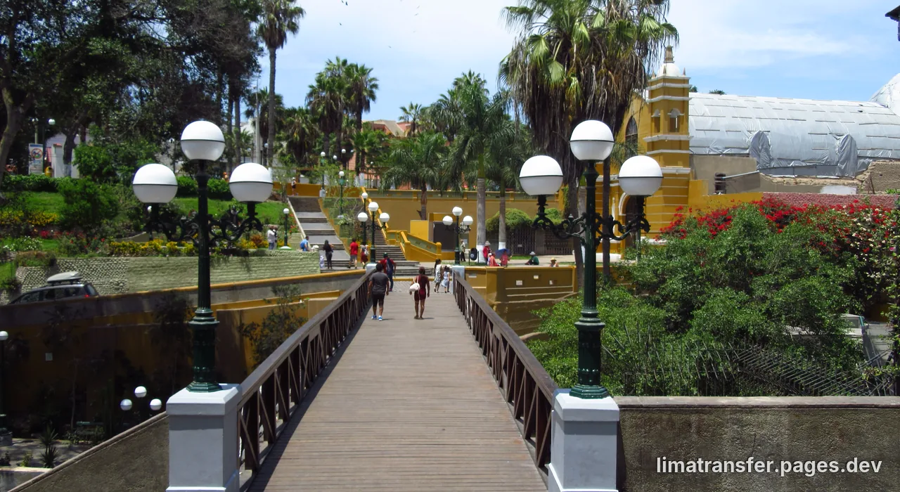 Barranco's pedestrian bridge Puente de los Suspiros with colorful colonial houses in the background